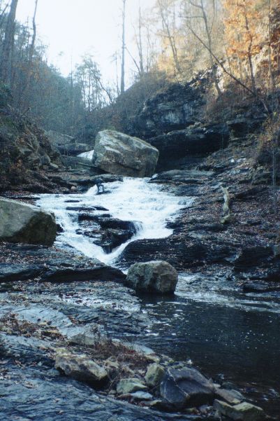 One of the many slides that separate the waterfalls.&nbsp; Note the big rock that has fallen in to provide the extra undercut angle.
These are pictures from a scouting hike in 1997.