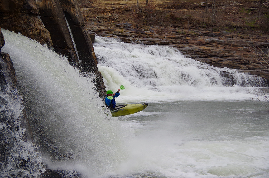 Pike Briggs running the park-and-huck dam drop. (Kellis Kincaid, March 2021)