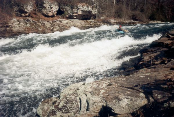 About 1995 Tony Baker ran the old mill slide at about  900 cfs.
His narration:  &quot;That was the fastest thing I've ever been on...&quot; 
(photo courtesy Tony Baker)