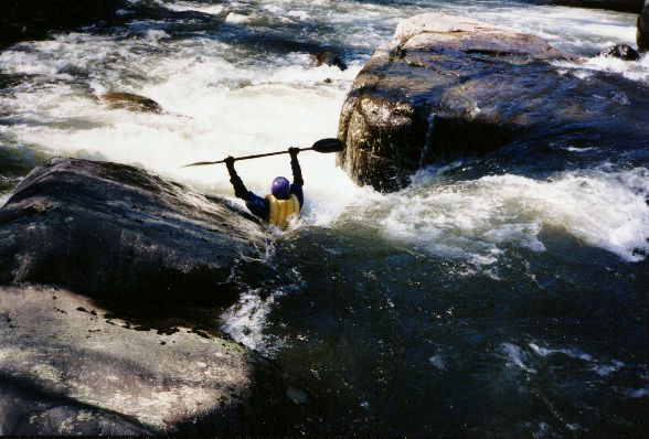 Jim Dowdy goes deep in the last slot above the Confluence Rapid.